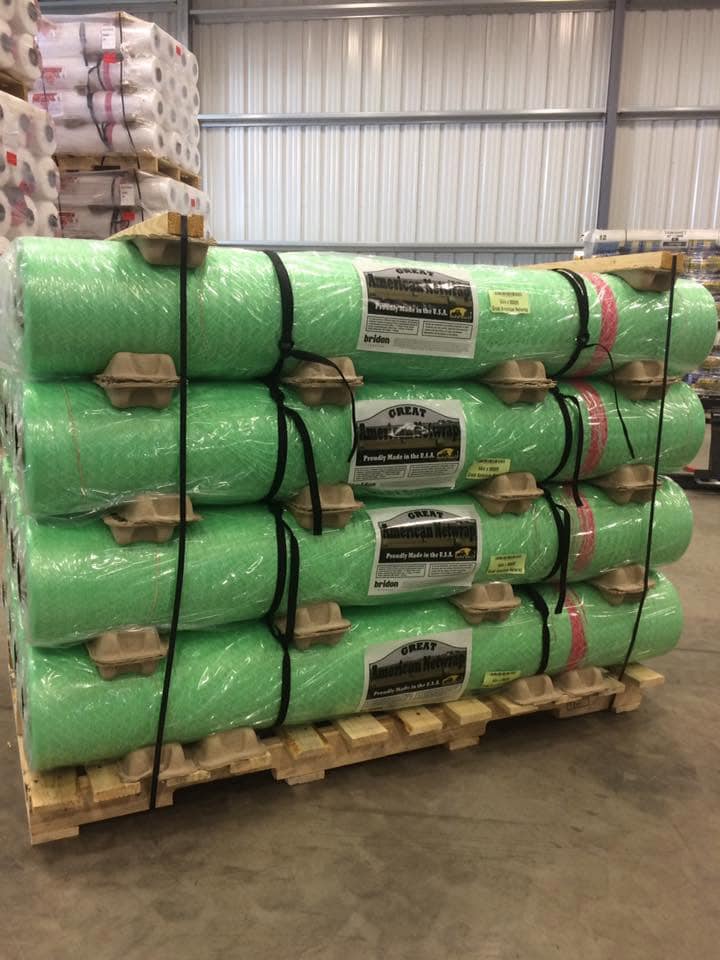 Pallet of green Great American Net Wrap rolls ready to ship